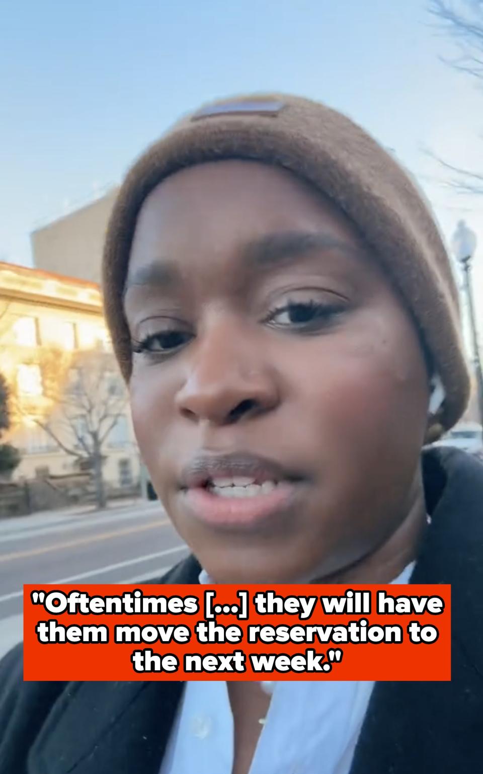 imani speaks to camera with a text overlay about moving a reservation to the next week