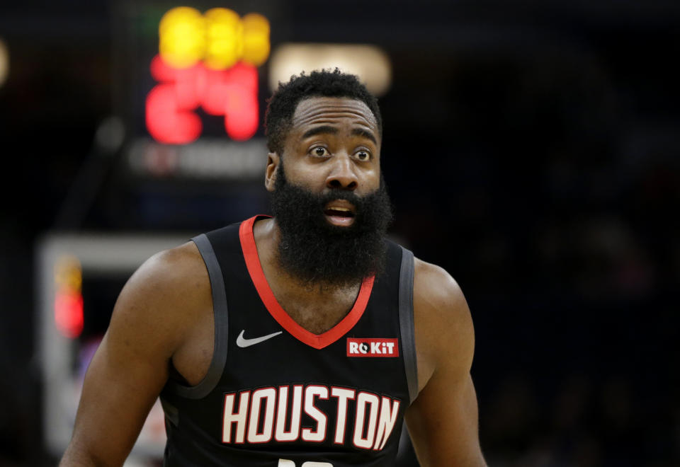 Houston Rockets guard James Harden looks at an official in the first quarter of a basketball game against the Minnesota Timberwolves Saturday, Nov. 16, 2019 in Minneapolis. (AP Photo/Andy Clayton- King)