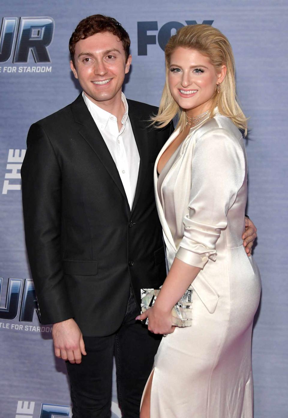 Daryl Sabara (L) and Meghan Trainor attend the season finale viewing party for FOX's "The Four" at Delilah on February 8, 2018 in West Hollywood, California