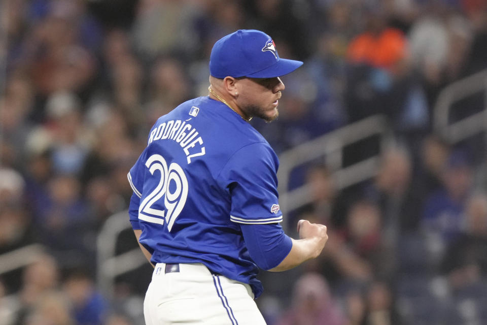 Toronto Blue Jays pitcher Yariel Rodriguez celebrates after the first inning of a baseball game against the Colorado Rockies in Toronto, Saturday, April 13, 2024. (Chris Young/The Canadian Press via AP)