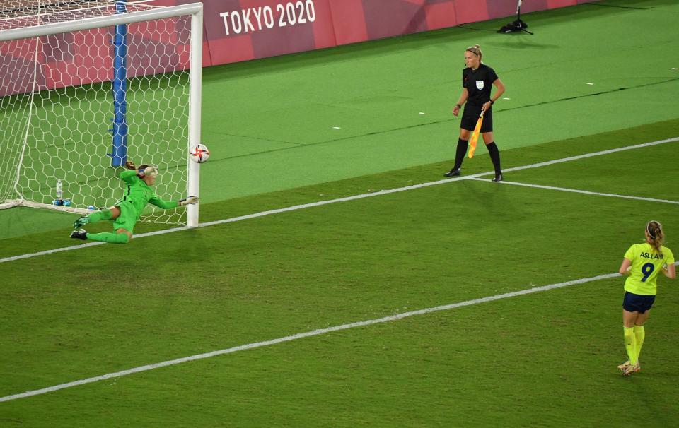 Sweden's Kosovare Asllani hits the post during penalty kicks at the Tokyo Olympics.