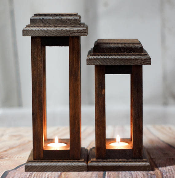 These <a href="https://www.etsy.com/listing/480988173/reclaimed-wood-lanterns-rustic?ga_order=most_relevant&amp;ga_search_type=all&amp;ga_view_type=gallery&amp;ga_search_query=thanksgiving%20table&amp;ref=sr_gallery_46" target="_blank">wooden lanterns</a> are the perfect accessory to a simple holiday centerpiece.