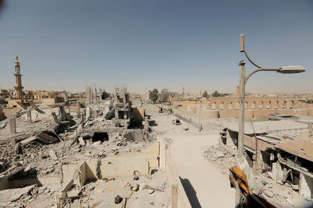 FILE PHOTO:Damaged buildings are pictured during the fighting with Islamic State's fighters in the old city of Raqqa, Syria, August 19, 2017. REUTERS/Zohra Bensemra/File Photo