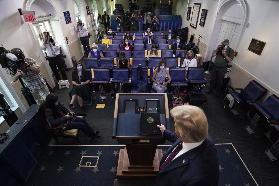 President Donald Trump arrives to speak during a briefing with reporters in the James Brady Press Briefing Room of the White House, Tuesday, Aug. 4, 2020, in Washington.(AP Photo/Alex Brandon)