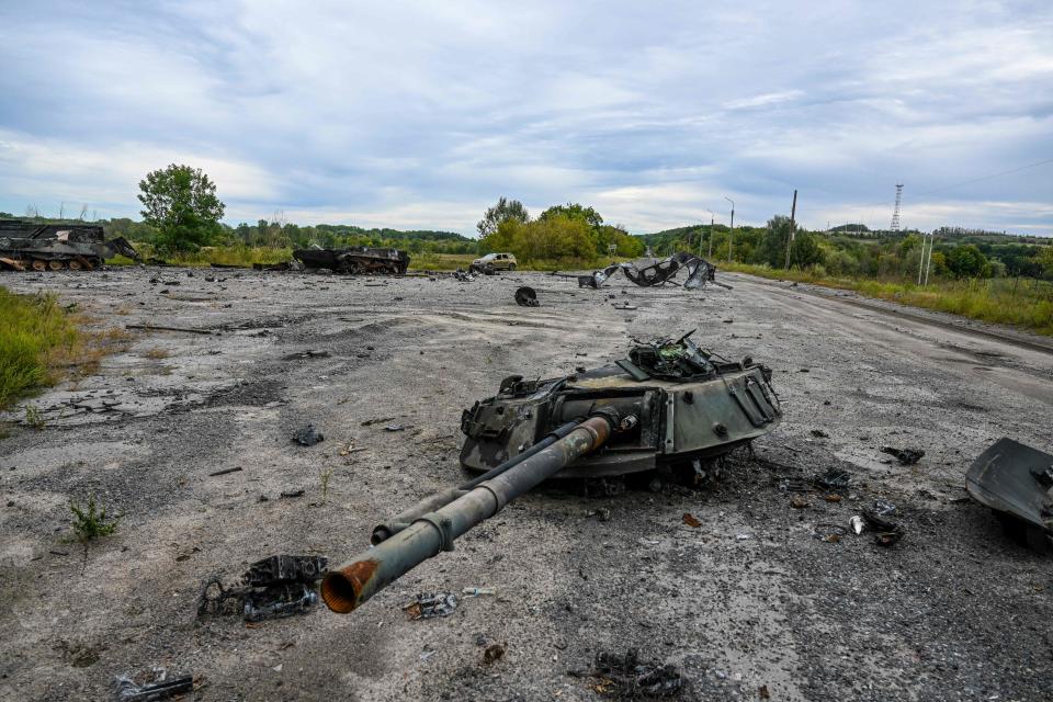 TOPSHOT - This photograph taken in Balakliya, Kharkiv region, on September 10, 2022 shows a destroyed military tank. - Ukrainian forces said September 10, 2022 they had entered the town of Kupiansk in eastern Ukraine, dislodging Russian troops from a key logistics hub in a lightning counter-offensive that has seen swathes of territory recaptured. (Photo by Juan BARRETO / AFP) (Photo by JUAN BARRETO/AFP via Getty Images)