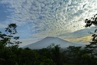 <p>A general view shows Mount Agung from Karangasem on the Indonesian resort island of Bali on September 24, 2017.<br> Authorities have raised alert levels for a volcano on the Indonesian resort island of Bali after hundreds of small tremors stoked fears it could erupt for the first time in more than 50 years. / AFP PHOTO / SONNY TUMBELAKA (Photo credit should read SONNY TUMBELAKA/AFP/Getty Images) </p>