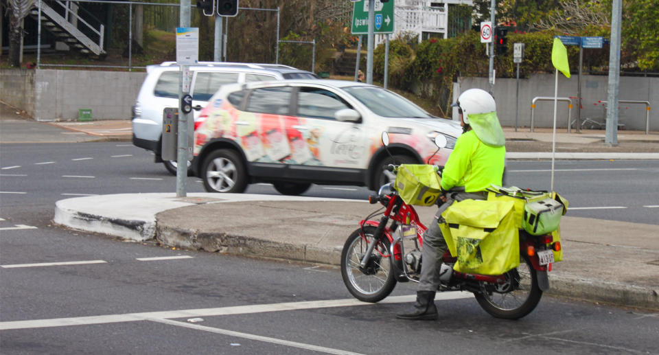 Australia Post plans to recognise the postie's efforts with the package on the Coal Coast in New South Wales.