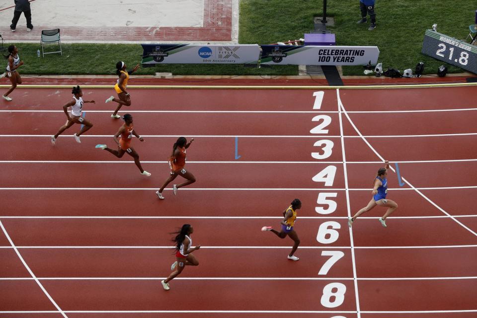 Abby Steiner of Kentucky (Lane 6) wins the women's 200 meters in a collegiate-record 21.8 seconds June 11. Also pictured (from top) are Melissa Jefferson of Coastal Carolina (1), Grace Nwokocha of North Carolina A&T (2), Edidong Odiong of Florida State (3), Kevona Davis (4) and Kynnedy Flnanel (5) of Texas, Favour Ofili of LSU (7) and Anavia Battle of Ohio State (8).