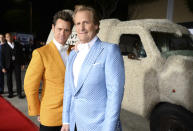 FILE - Jim Carrey, left, and Jeff Daniels arrive at the premiere of "Dumb and Dumber To" on Nov. 3, 2014, in Los Angeles. Daniels tackles his life and career in an absorbing, unconventional way this month with a music-and skit-filled audio memoir from Audible, "Alive and Well Enough." (Photo by Jordan Strauss/Invision/AP, File)