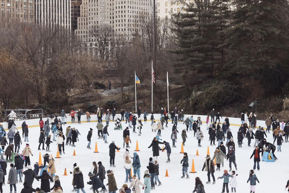 People ice skate on Christmas Day at Central Park on Sunday, Dec. 25, 2022, in New York. (AP Photo/Andres Kudacki)