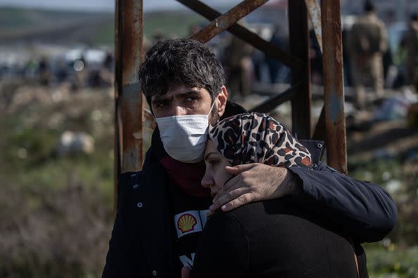 HATAY, TURKEY - FEBRUARY 10: Family members mourn during the funeral of the victim of the earthquake to the mass graves on February 10, 2023 in Hatay, Turkey. A 7.8-magnitude earthquake hit near Gaziantep, Turkey, in the early hours of Monday, followed by another 7.5-magnitude tremor just after midday. The quakes caused widespread destruction in southern Turkey and northern Syria and were felt in nearby countries. (Photo by Burak Kara/Getty Images)