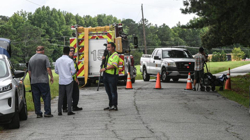 Anderson County Fire ask bystanders and media to move further back from 200 yards from the scene of a train derailment along State Highway 20 just outside the city limits of Belton, S.C. Thursday, July 25, 2024.