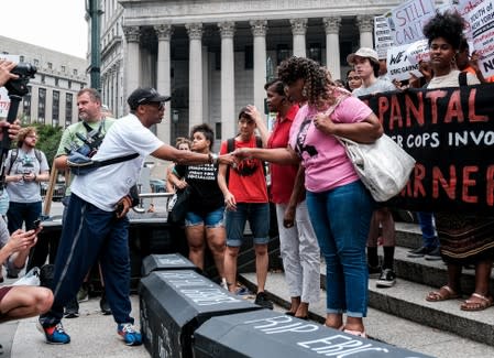 Protesters march and rally on the fifth anniversary of the death of Eric Garner in New York