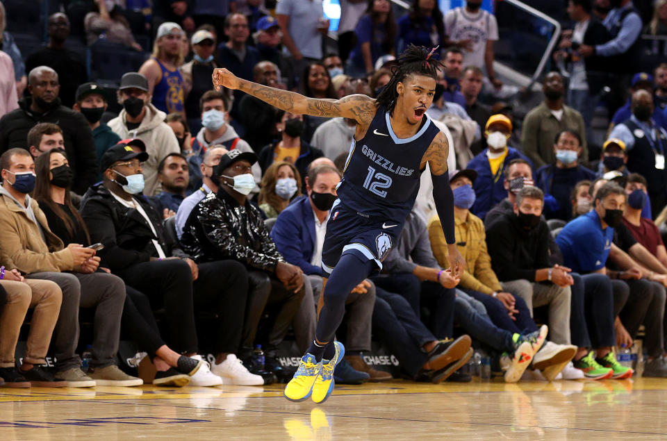 SAN FRANCISCO, CALIFORNIA – OCTOBER 28: Ja Morant #12 of the Memphis Grizzlies celebrates after they beat the Golden State Warriors in overtime at Chase Center on October 28, 2021 in San Francisco, California. NOTE TO USER: User expressly acknowledges and agrees that, by downloading and/or using this photograph, User is consenting to the terms and conditions of the Getty Images License Agreement. (Photo by Ezra Shaw/Getty Images)