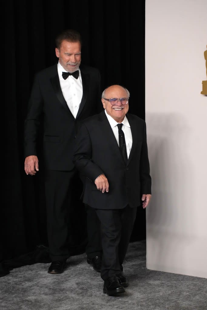 Arnold Schwarzenegger and Danny DeVito at the 2024 Oscars. FilmMagic