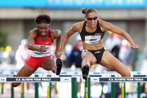 Lolo Jones (R) compete in the women's 100m hurdles final at the US Olympic Track and Field Team Trials on June 23. Jones, who led at the Beijing final before stumbling over the penultimate hurdle, qualified for London in the 100 hurdles