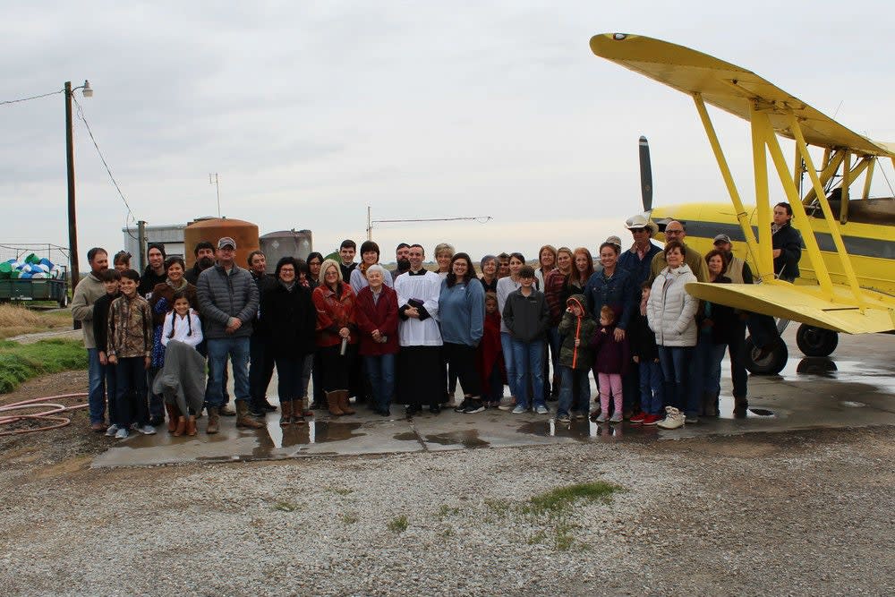 Parishioners brought water from their home to be blessed and loaded onto the plane: Diocese of Lafayette/Facebook