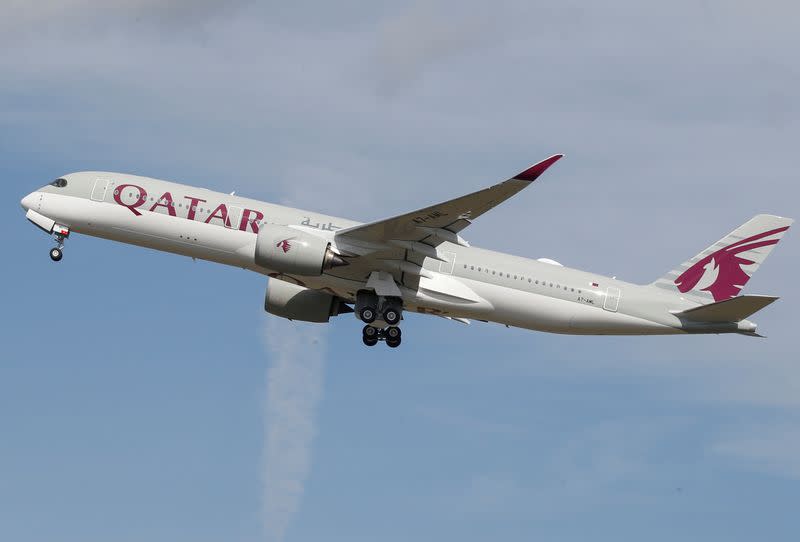 FILE PHOTO: A Qatar Airways aircraft takes off at the aircraft builder's headquarters of Airbus in Colomiers near Toulouse