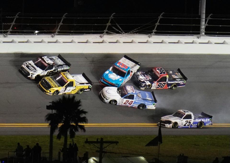 Rajah Caruth (24) gets loose and spins, taking out Daniel Dye (43) and Matt DiBenedetto (25) in Stage 2 of Friday's NextEra Energy 250.