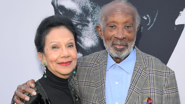 Music executive Clarence Avant (right) died Sunday in his Los Angeles Home. Here, he and his wife, Jacqueline Avant, attend Netflix’s world premiere of “The Black Godfather,” a documentary about his life, at the Paramount Theater in June 2019 in Los Angeles. (Photo by Charley Gallay/Getty Images)