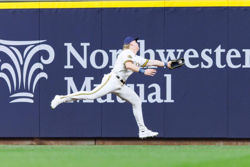 Brewers centerfielder Joey Wiemer makes a running catch in right-center during the third inning against the Orioles on  Tuesday night.