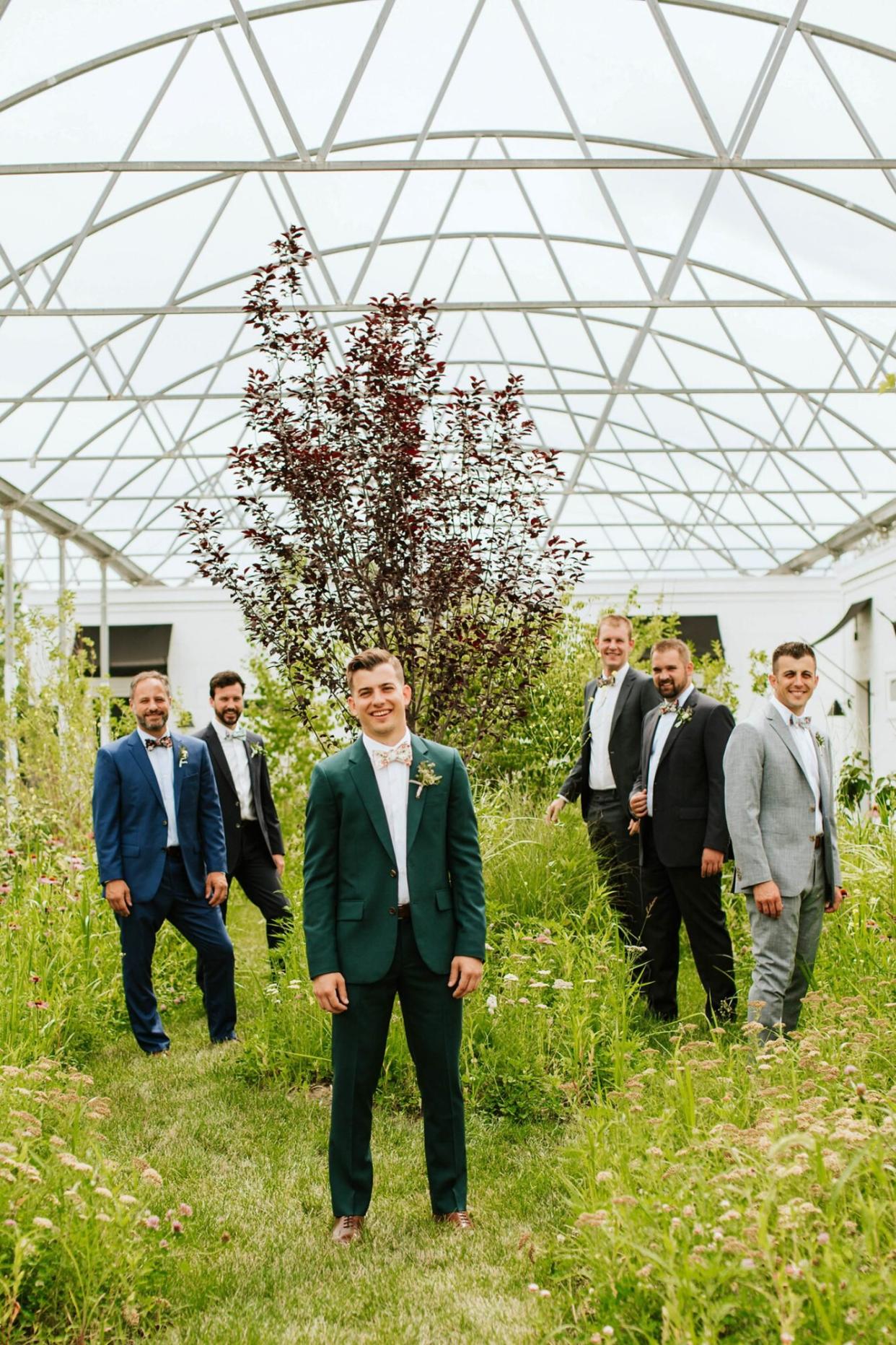 rose chris wedding groomsmen in greenhouse