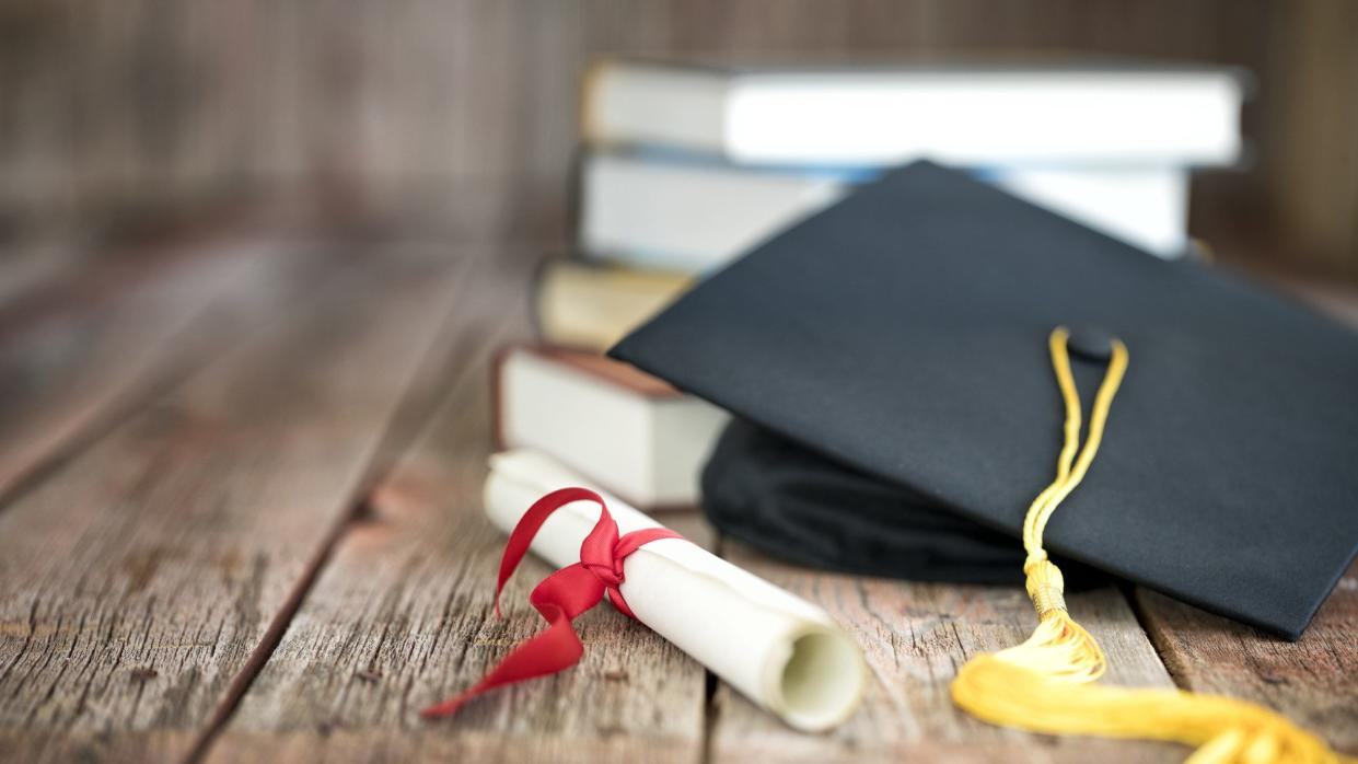 graduation cap and diploma