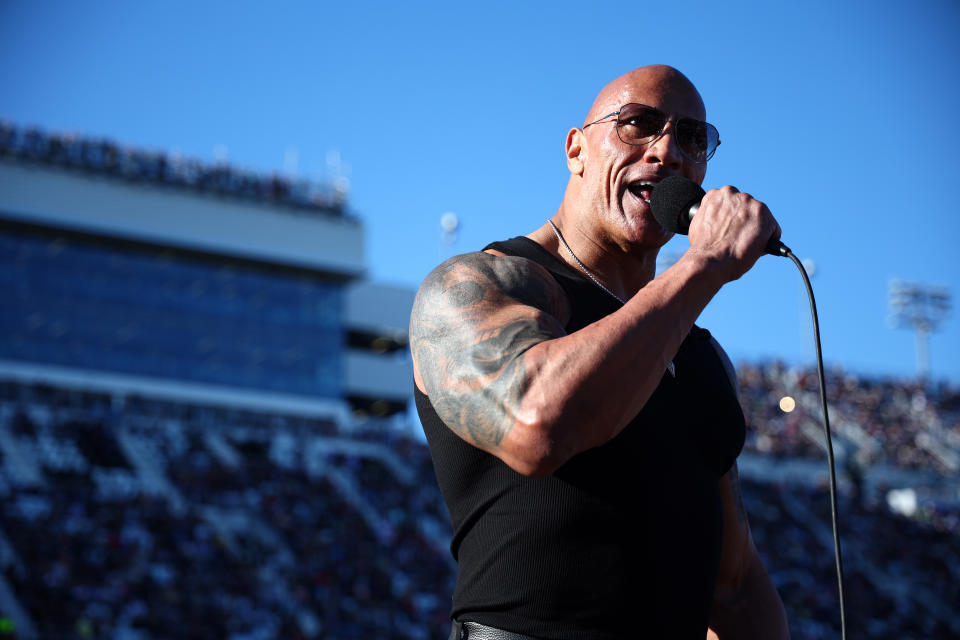 DAYTONA BEACH, FLORIDA - FEBRUARY 19: Grand Marshal Dwayne “The Rock” Johnson gives the command to start engine prior to the NASCAR Cup Series Daytona 500 at Daytona International Speedway on February 19, 2024 in Daytona Beach, Florida. (Photo by Jared C. Tilton/Getty Images)