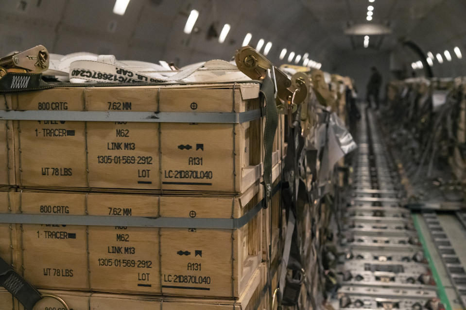 FILE - In this image provided by the U.S. Air Force, pallets of ammunition, weapons and other equipment bound for Ukraine are loaded on a plane by members from the 436th Aerial Port Squadron during a foreign military sales mission at Dover Air Force Base, Del., on Jan. 30, 2022. Western weaponry pouring into Ukraine helped blunt Russia's initial offensive and seems certain to play a central role in the approaching battle for Ukraine's contested Donbas region. Yet the Russian military is making little headway halting what has become a historic arms express. (Senior Airman Stephani Barge/U.S. Air Force via AP)
