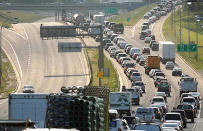 Morning commutors sit in bumper-to-bumper traffic on July 12, 2012. Flooding had forced the city to close Whitemud Drive following an early morning storm.