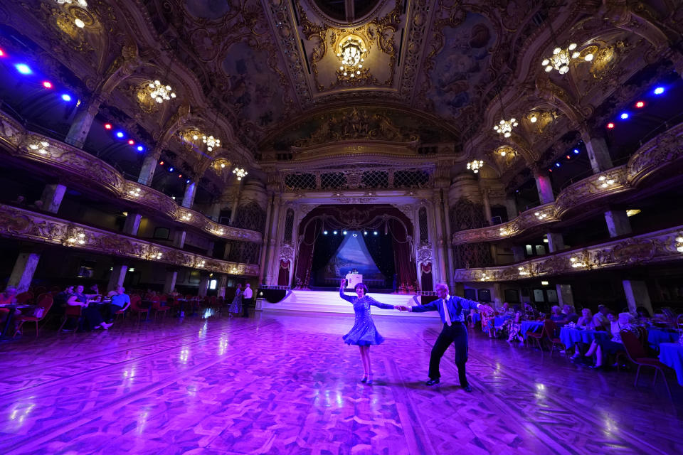 People dancing in the Blackpool Tower Ballroom, after the final legal restrictions were lifted in England. Picture date: Monday July 19, 2021.