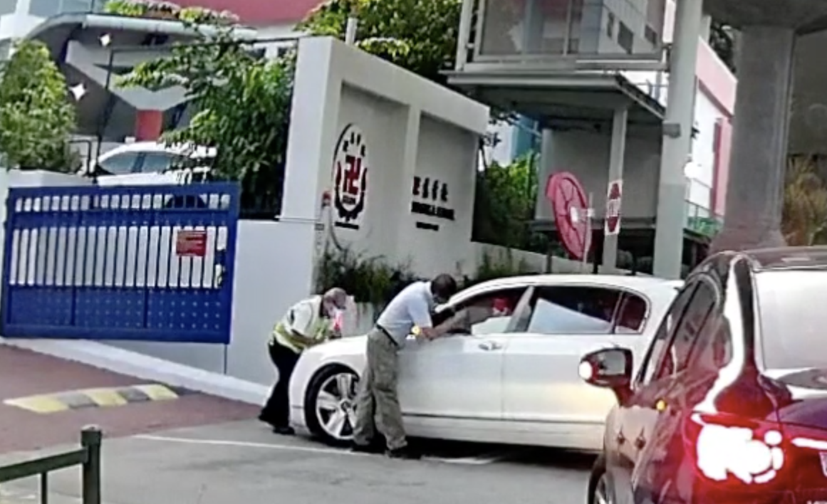 An incident involving a Bentley driver at Red Swastika School on 11 January 2022. (SCREENGRAB: SGRV/Facebook)