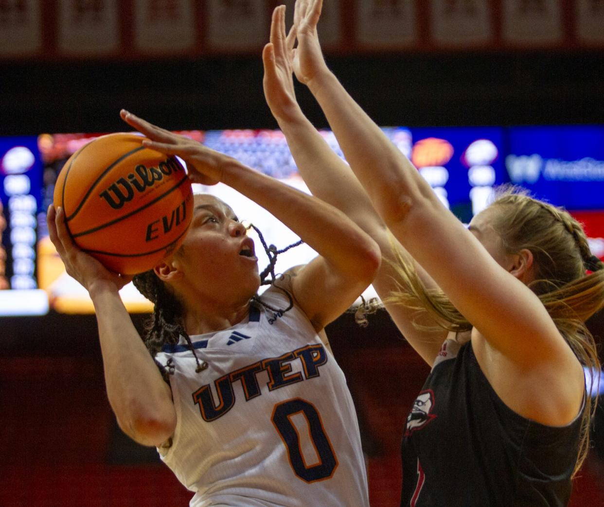 UTEp's Mahri Petree jumps up for a shot as a SUU defender jumps up to try and block her at the Don Haskins center on Dec. 30, 2023.