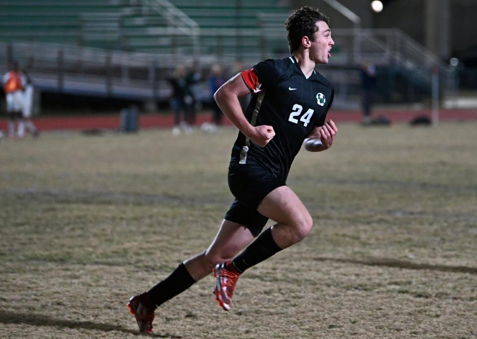 Lakewood Ranch High's Drew Clark celebrates the Mustangs region quarterfinal victory.