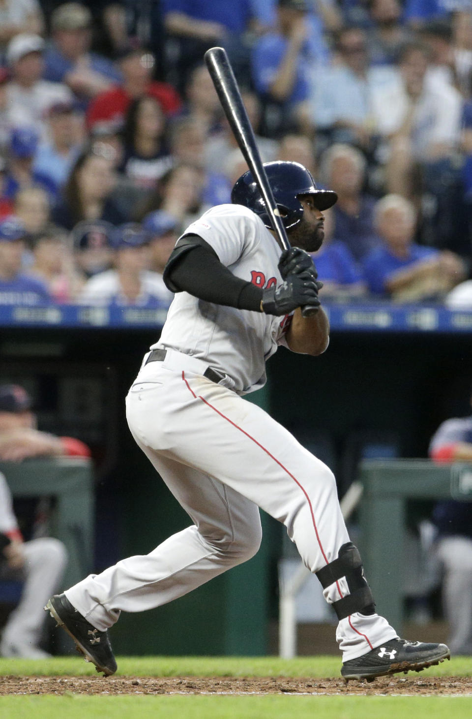 Boston Red Sox's Jackie Bradley Jr. watches his three-run double during the fifth inning of the team's baseball game against the Kansas City Royals on Wednesday, June 5, 2019, in Kansas City, Mo. (AP Photo/Charlie Riedel)