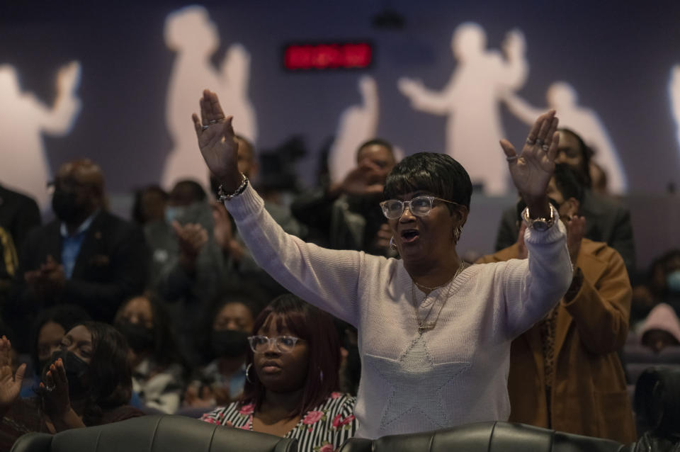 Linda Gamble, right, mother of Lorenzo Gamble, 43, of Chesapeake, Va., stands during a prayer vigil held by the Chesapeake Coalition of Black Pastors at The Mount (Mount Lebanon Baptist Church) in Chesapeake, Va., Sunday, Nov. 27, 2022, for the six people killed at a Walmart in Chesapeake, Va., including Lorenzo Gamble, when a manager opened fire with a handgun before an employee meeting Tuesday night. (AP Photo/Carolyn Kaster)
