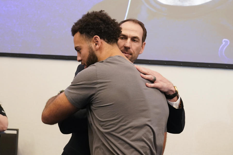 Indianapolis Colts new head coach Shane Steichen hugs wide receiver Michael Pittman following an NFL football news conference, Tuesday, Feb. 14, 2023, in Indianapolis. (AP Photo/Darron Cummings)