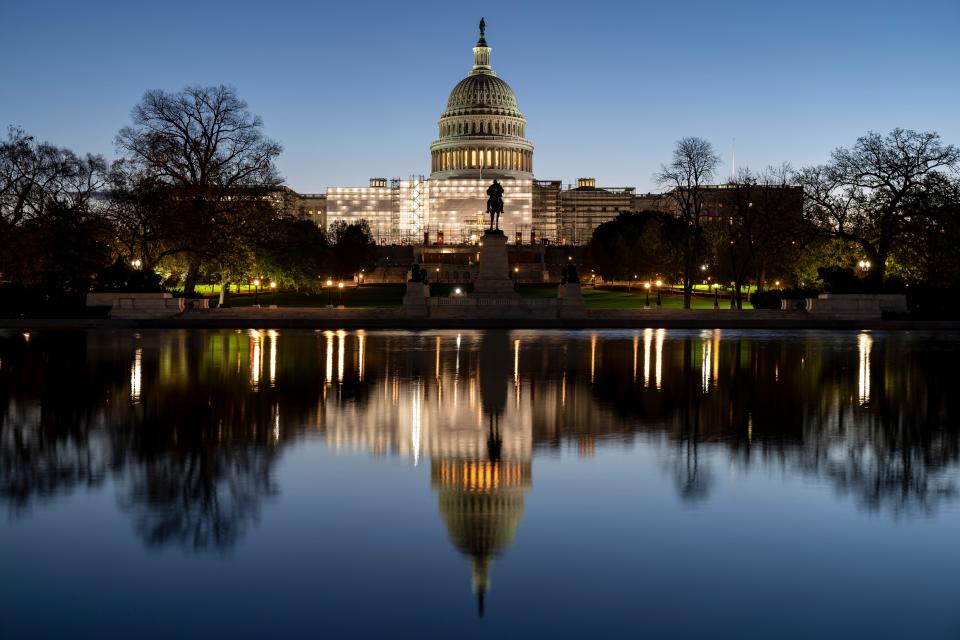 The Capitol is seen as Congress resumes following a long break for the midterm elections, early Monday, Nov. 14, 2022, in Washington. Lawmakers are returning to an extremely volatile post-election landscape, with control of the House still undecided, party leadership in flux and a potentially consequential lame-duck session.