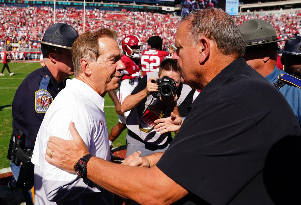 Oct 14, 2023; Tuscaloosa, Alabama, USA; Alabama Crimson Tide head coach Nick Saban greets Arkansas Razorbacks head coach Sam Pittman midfield following their 24-21 win against the Arkansas Razorbacks at Bryant-Denny Stadium. Mandatory Credit: John David Mercer-USA TODAY Sports