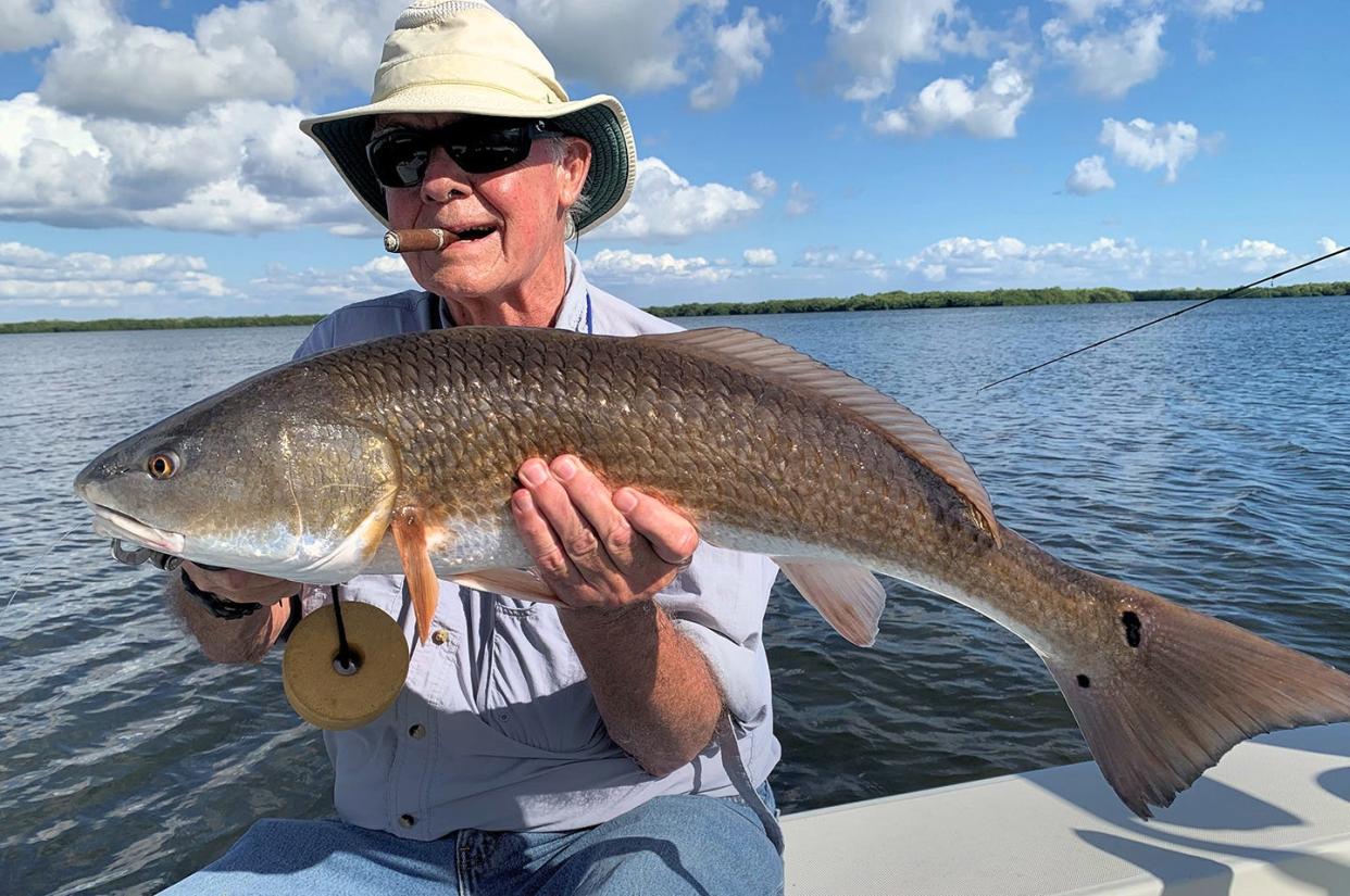 Keith McClintock, of Lake Forest, Illinois, caught this redfish on a D.O.A. CAL shad tail and jig while fishing Gasparilla Sound with Capt. Rick Grassett recently.