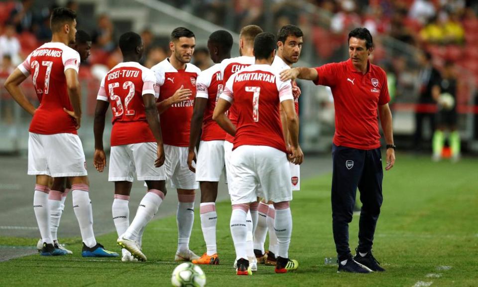 Unai Emery alongside some of his players during Arsenal’s pre-season match against Atlético Madrid in Singapore. The Spaniard is Arsenal’s first new manager in over two decades