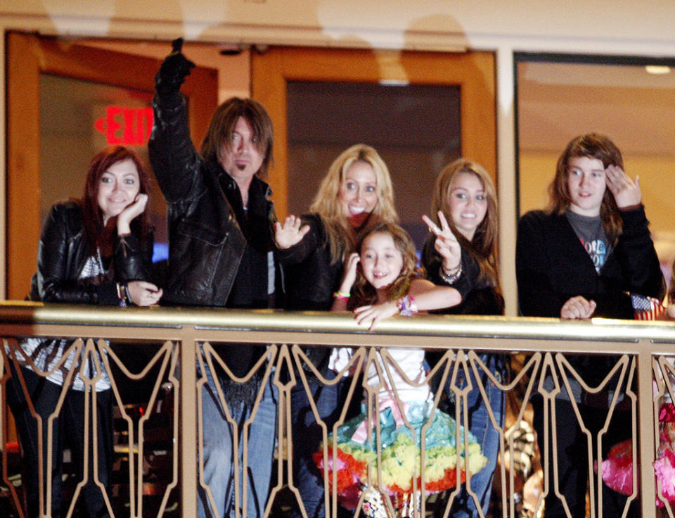 <p>Most of the family was behind the 2009 launch of the Lollipops and Rainbows Foundation, a charity started by Miley’s <em>Hannah Montana: The Movie</em> co-star Emily Grace Reaves. Glammed up for the event were, from left, Brandi, Billy Ray, Tish, Noah, Miley, and Braison. (Photo: Kevin Winter/Getty Images) </p>