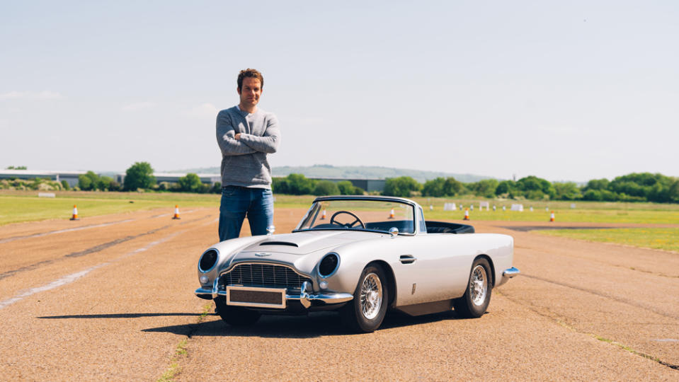 Automotive journalist Tim Pitt stands beside the Little Car Company's DB5 Junior "No Time To Die" Edition for a sense of scale.