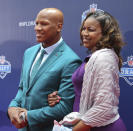 Ohio State linebacker Ryan Shazier, left, poses for photos with his mother, Shawn Shazier upon arriving for the first round of the 2014 NFL Draft, Thursday, May 8, 2014, in New York. (AP Photo/Craig Ruttle)