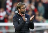 Britain Football Soccer - Liverpool v Crystal Palace - Premier League - Anfield - 23/4/17 Liverpool manager Juergen Klopp applauds fans after the match Reuters / Phil Noble Livepic