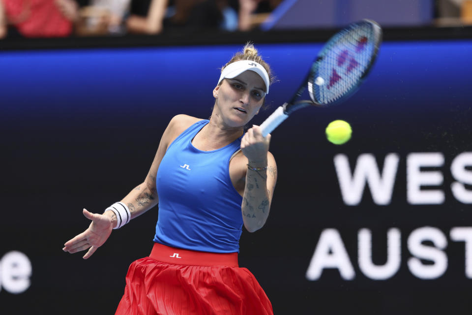 Marketa Vondrousova of the Czech Republic hits a return to Olga Danilovic of Serbia during the United Cup tennis tournament in Perth, Australia, Tuesday, Jan. 2, 2024. (AP Photo/Trevor Collens)