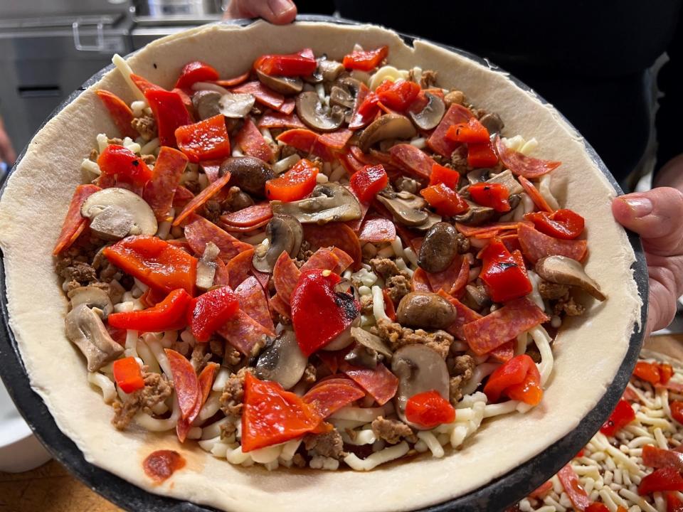The Southside Leroy Brown, named for one of Frank "Bamie" Bonanno's favorite songs, features sausage made by the Bonanno family, pepperoni mushrooms, peppers, shredded mozzarella and red sauce.