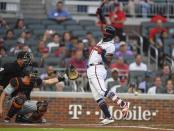 Aug 15, 2018; Atlanta, GA, USA; Atlanta Braves left fielder Ronald Acuna Jr. (13) is hit by the first pitch of the game against the Miami Marlins during the first inning at SunTrust Park. Mandatory Credit: Dale Zanine-USA TODAY Sports