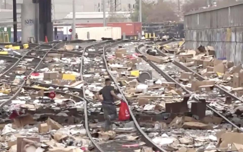 Packages discarded by thieves cover nearly every inch of the railway lines in some areas