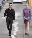 <p>Though we're sure movie publicity tours can be arduous, Malek and Boynton always managed to complete them looking painfully chic. For an visit to Jimmy Kimmel Live in October 2018, Boynton wore floral Valentino.</p>